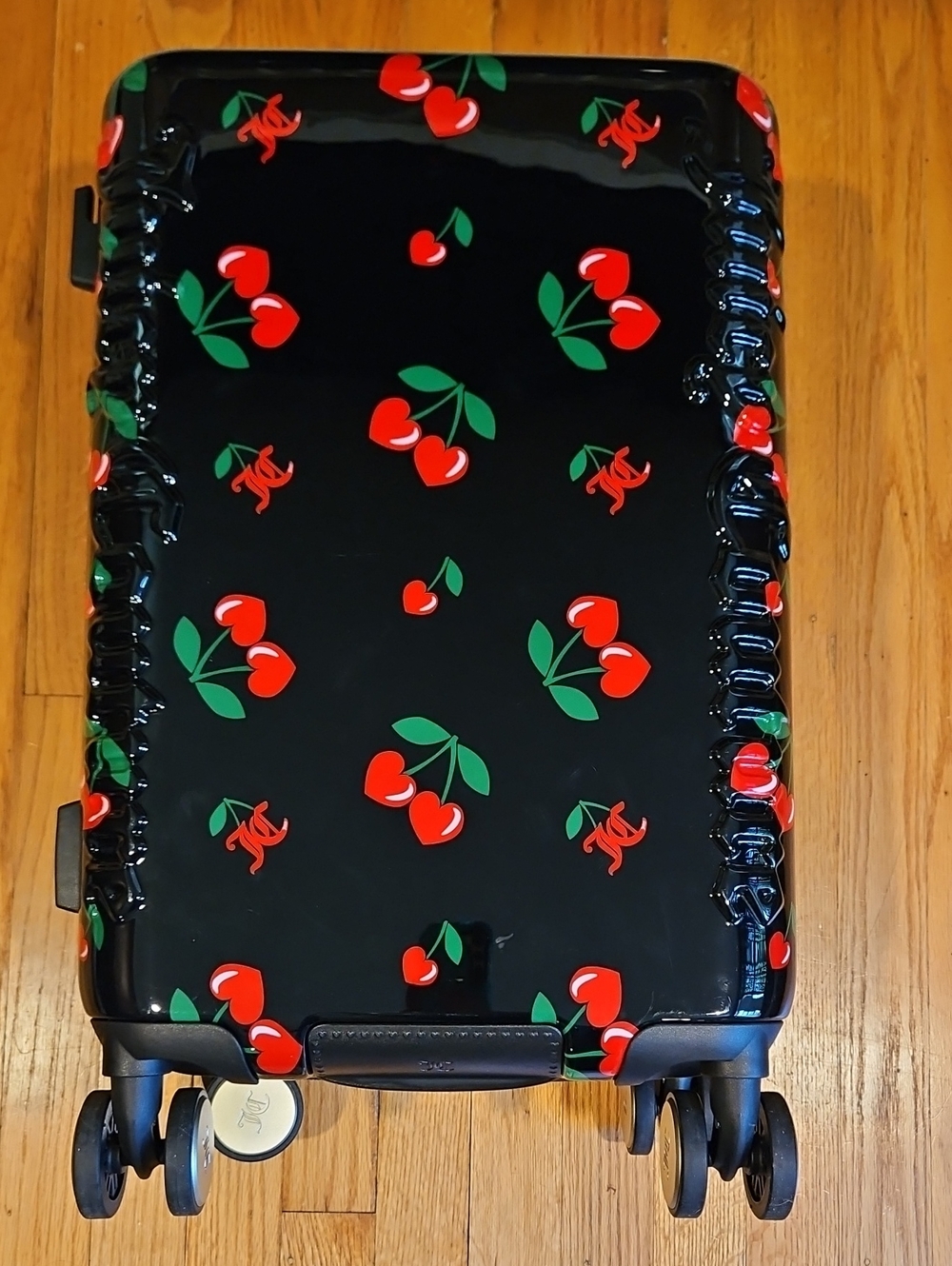 Juicy Couture Black Cherry Carry-On with Gold Zipper Accents